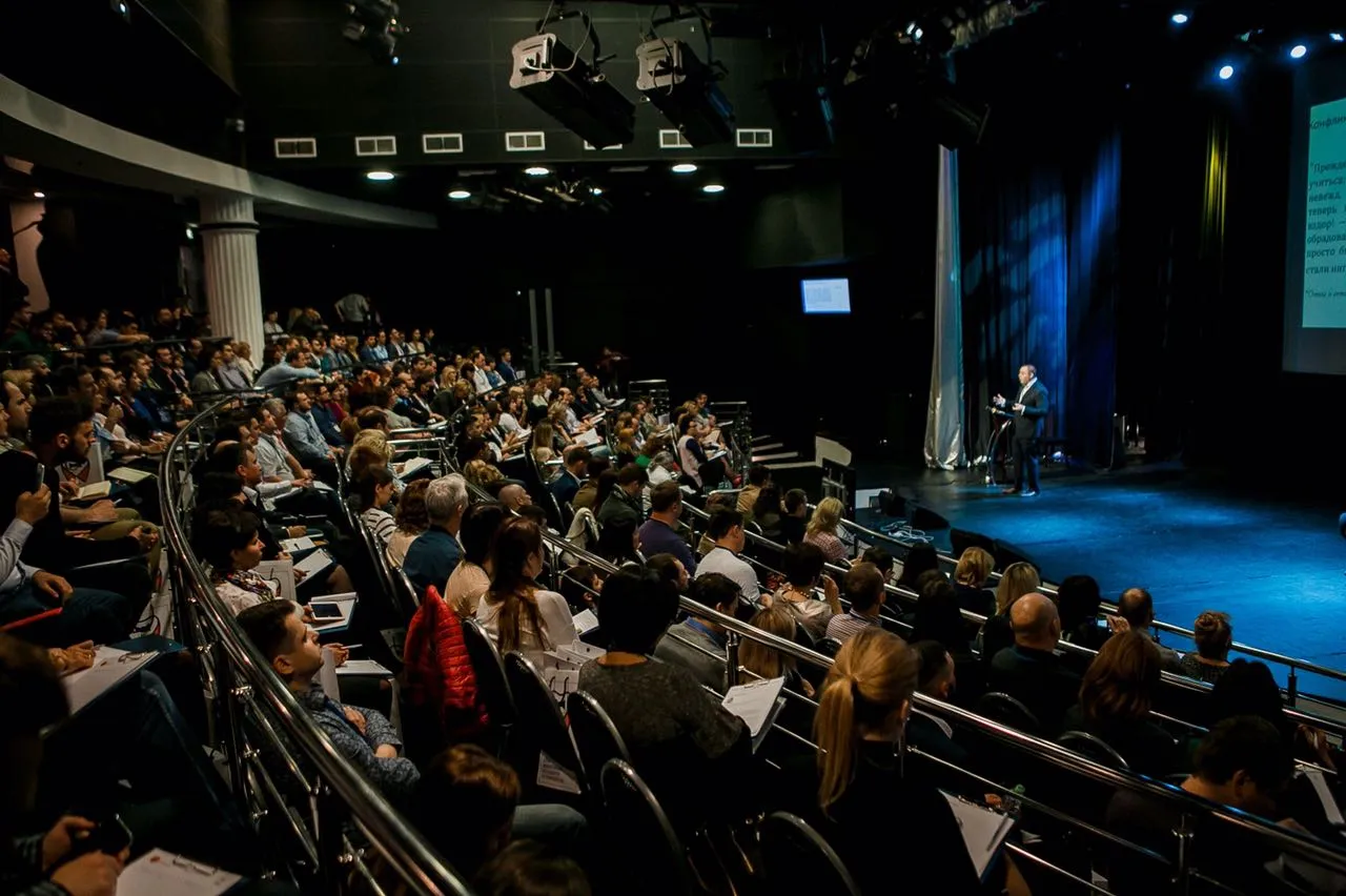 On stage at a dental conference